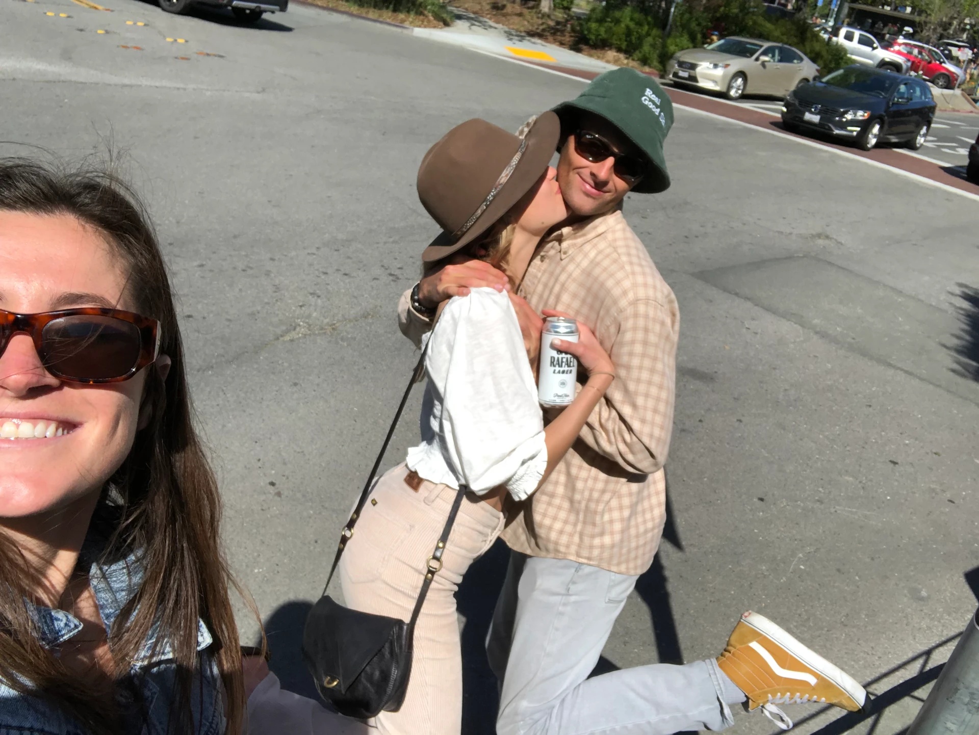 Claire and Willy with friends on a sunny street